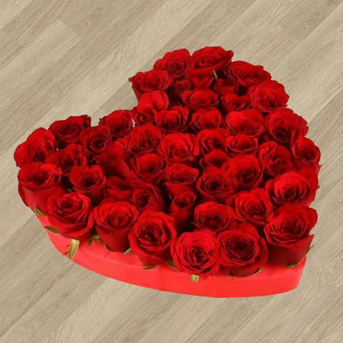 Impressive 101 Fresh Red Roses Arrangement in Heart Shape for Celebration