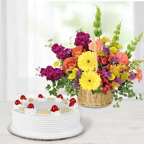 Tasty Pineapple Cake with Colorful Flowers Arrangement