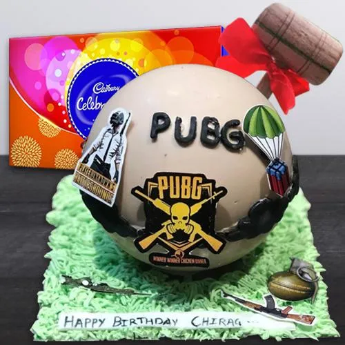 Amusing PUBG Styled PiÃ±ata Cake with Hammer n Cadbury Celebrations Pack