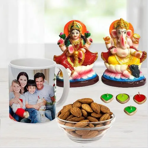 Attractive Ganesh Laxmi Idol with Personalized Coffee Mug, Cadbury Chocolates n Almonds, Free Wax Diya