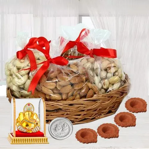 Tasteful Basket of Premium Dry Fruits for Diwali with Ganesh Idol 4 Diya n Free Coin