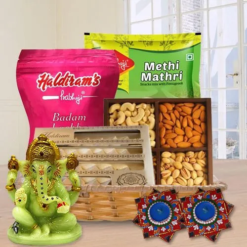 Diwali Gift Hamper of Dry Fruits, Haldriam Sweets, Ganesh Idol  N  Dot Mandala Art Diya