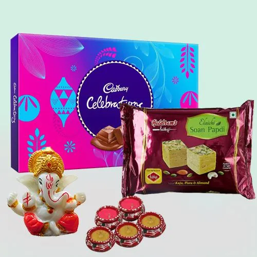 Lovely Gift of Cadbury Chocolate with Haldiram Sweets n Ganesha Idol