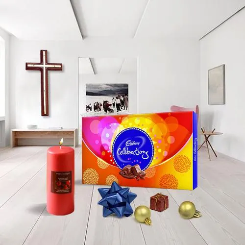 Excellent Combo of Christ Cross, Pillar Candle n Assorted Chocolates
