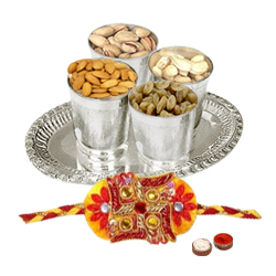 Outstanding Gift of Dry Fruits collections in 4 Silver Glasses and Tray Accompanied with Free Rakhi