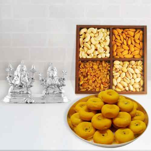 Beautiful Silver Plated Ganesh Lakshmi with Sweets and Dry Fruits