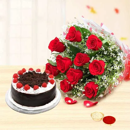 Charming Red Roses along with delicious Black Forest Cake with free Roli Tilak and Chawal