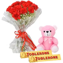 Exotic Red Carnation Bouquet with Toblerone Chocolate N Teddy