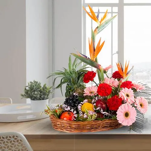Shop for Fresh Fruits Basket with Mixed Flowers