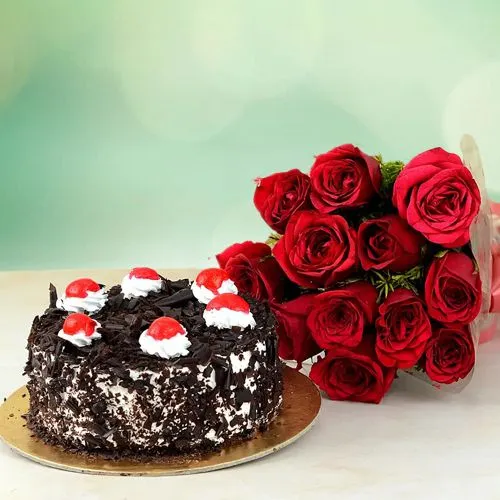 Enticing Combo of 12 Roses Bouquet with Black Forest Cake