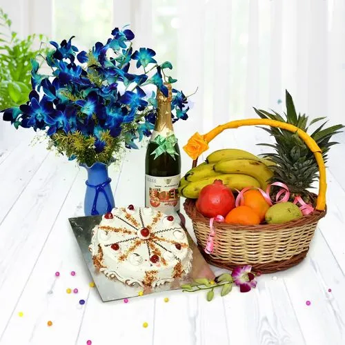 Tasty Butterscotch Cake n Blue Orchids with Mixed Fruit Basket n Fruit Juice