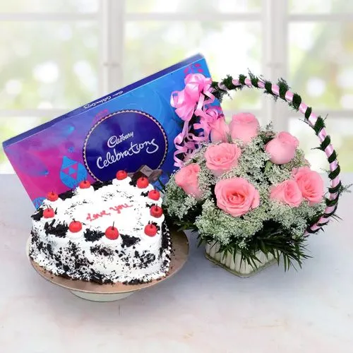 Beautiful Pink Roses with Black Forest Cakes n Cadbury Chocolates
