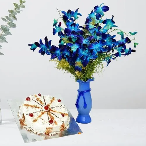 Exclusive Combo of Blue Orchids in Vase with Butterscotch Cake