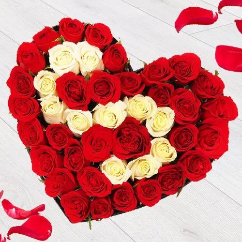 Lovely Heart-Shape Arrangement of Red  N  White Roses
