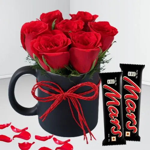Dazzling Red Roses in Black Ceramic Mug with Mars Chocolate