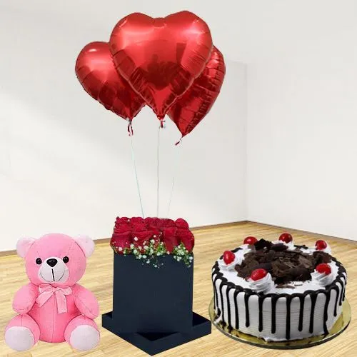 Mesmerizing Display of Roses n Heart Balloons in Black Box with Black Forest Cake n Teddy