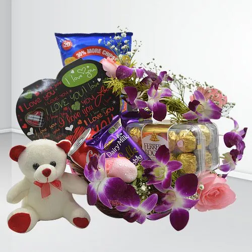 Attractive Floral Basket of Valentine Gourmets with Teddy