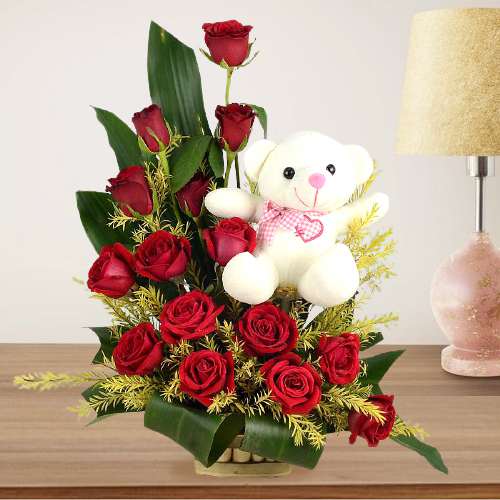 Sweet Teddy Seated on Red Roses Basket