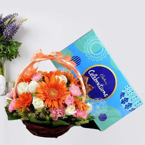 Terrific Combo of Mixed Flower Basket n Cadbury Celebrations