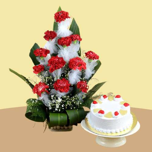 Gorgeous Red Carnations with Pineapple Cake Combo