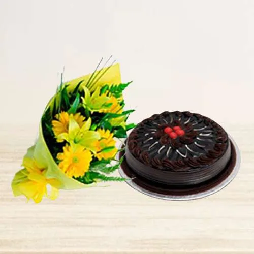 Mesmerizing Bunch of Gerberas n Lilies with Chocolate Cake