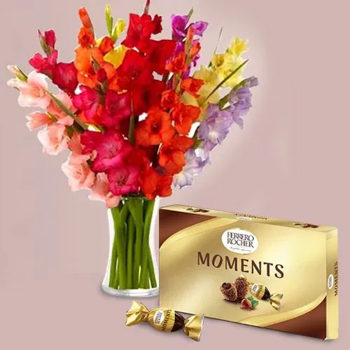 Colorful display of Gladiolus in Glass Vase with Ferrero Rocher Moment