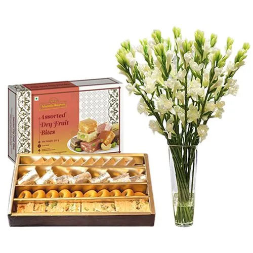 Adyar Ananda Bhawan Assorted Sweets Pack with Rajnigandha Stems in a Glass Vase