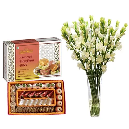 Adyar Ananda Bhawan Assorted Dry Fruit Sweets with Rajnigandha Stems in a Glass Vase