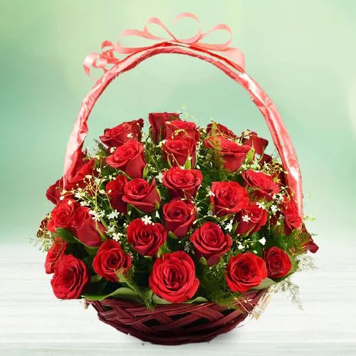 Ravishing Basket of 50 Red Roses