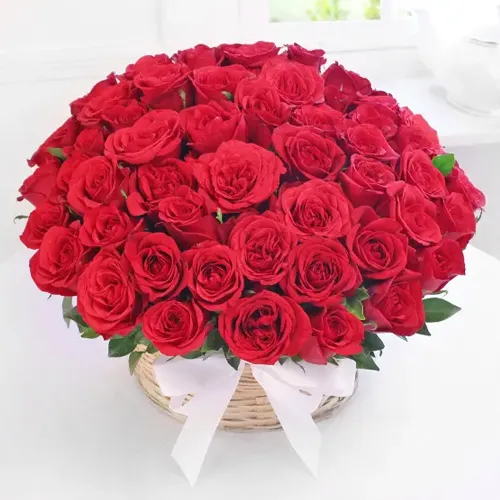 50 Red Roses Arranged in a Basket with Greens , Fillers to show you are there on this auspicious occsion