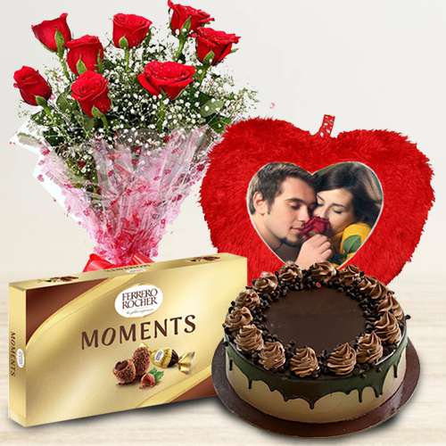 Alluring Gift of Red Rose Bouquet n Personalized Cushion with Ferrero Moments n Choco Cake		