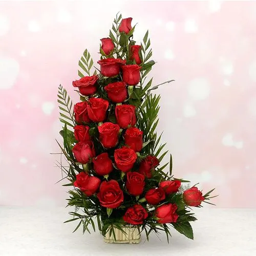 Blushing Red Roses Arrangement in a Round Basket