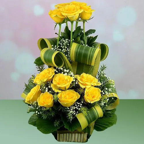 Exotic Display of Yellow Roses with Greens in Basket	