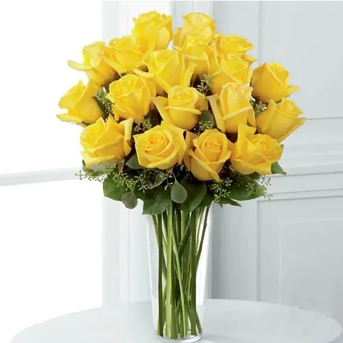 Unforgettable display of Long Stem Yellow Roses in a Vase