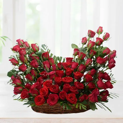Pretty Display of Red Roses in Oval Basket