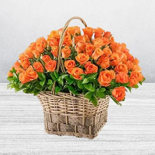 Magnificent Orange Roses with Greens in a Basket