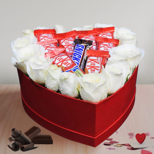 Captivating Arrangement of White Roses N Chocolate in Heart Box