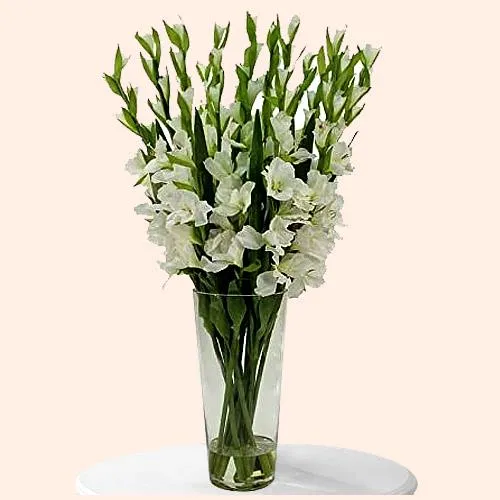 Exclusive White Gladiolus in a Glass Vase