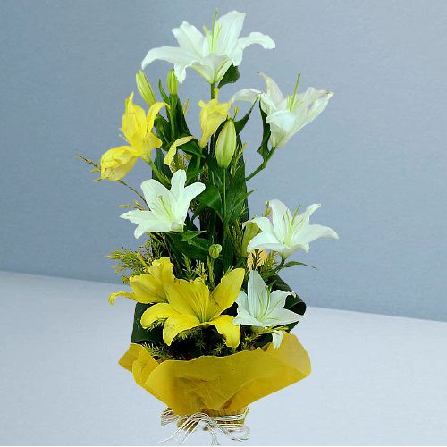 Trendy Basket of Yellow n White Lilies