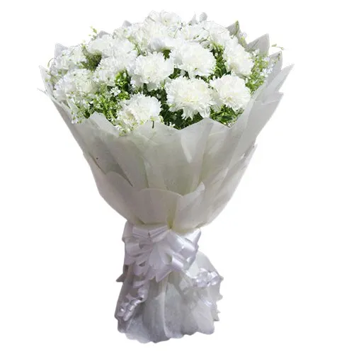 Shop for this elegant Hand Bouquet of Online White Cranations in a tissue wrap