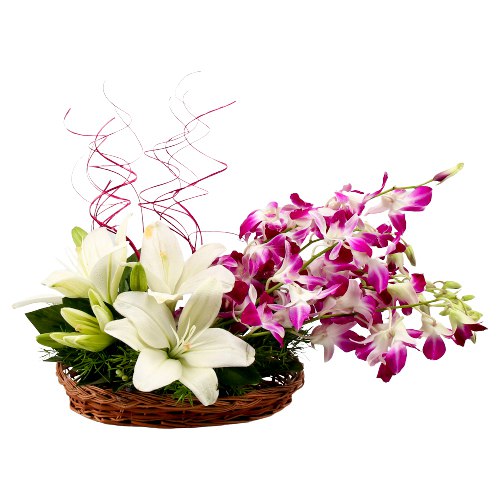Heavenly Basket Arrangement of White Lilies nd Orchids