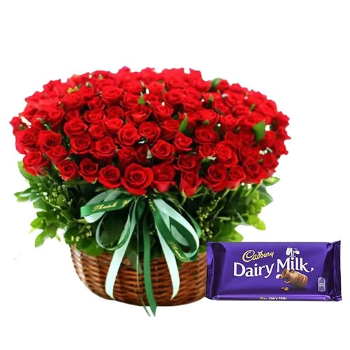 100 Exclusive Dutch Red Roses Arrangement with Cadburys Chocolate