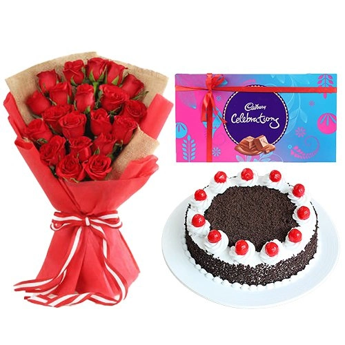 18 Dutch Red Roses Bouquet with 1 Lbs. Black Forest Cake and 1 Cadburys Celebration Pack