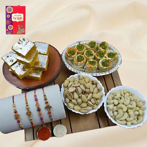 Exquisite Set of 4 Rakhis with Haldiram Sweets N Assorted Dry Fruits