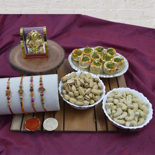 Exclusive Rakhi Set of 4 with Haldiram Sweets, Dry Fruits N Ganesh Idol