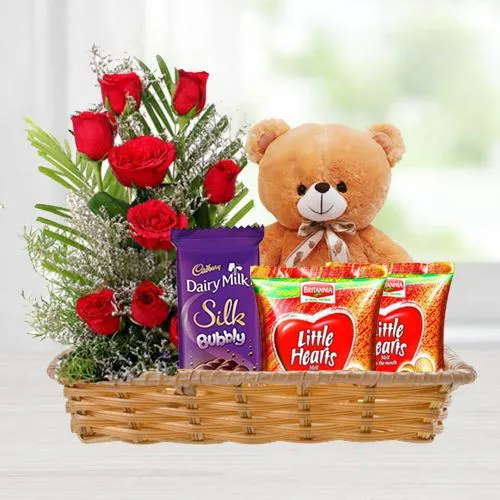Marvelous Red Rose Bouquet with Black Forest Cake N Teddy to Varanasi, India