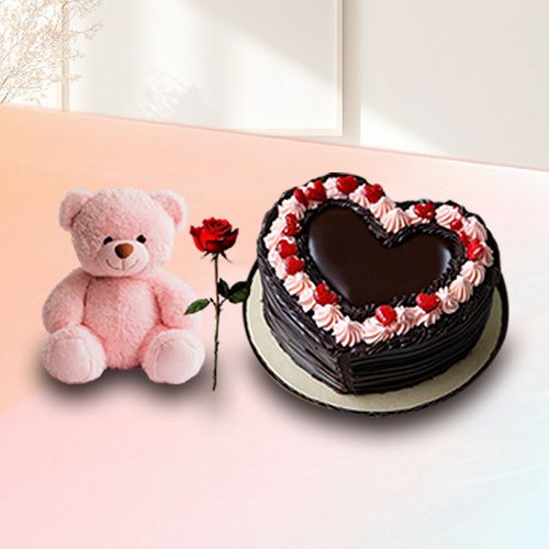 Exciting Gift of Chocolaty Heart Shape Cake with Sweet Teddy N Red Rose