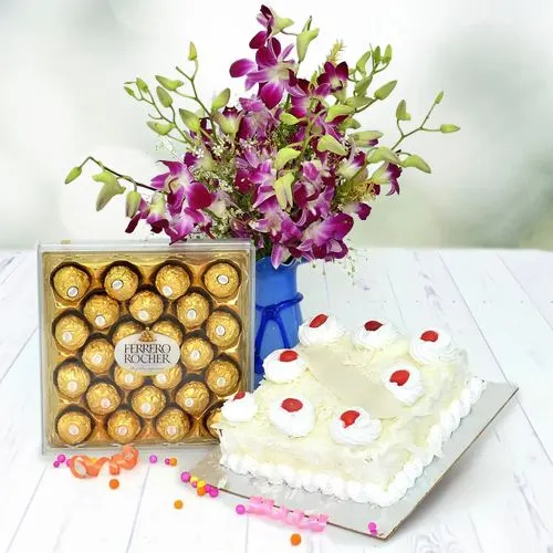 Breathtaking Combo of Purple Orchids in Vase, White Forest Cake N Ferrero Rocher