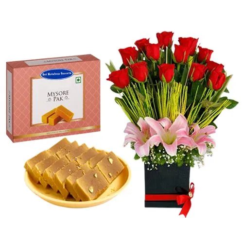 Sri Krishna Sweets Mysurpa with a Designer Flower Arrangement