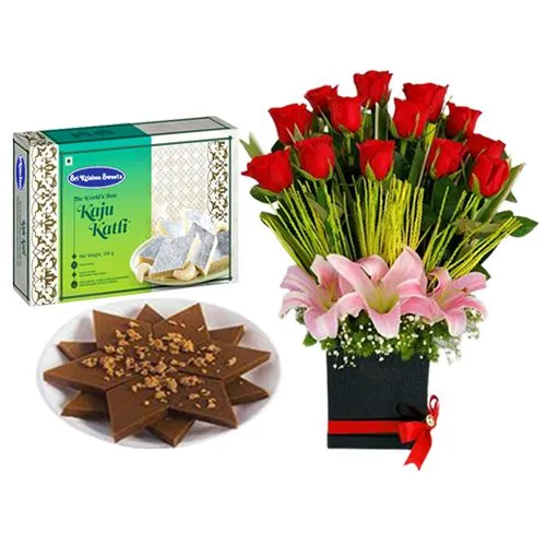 Sri Krishna Sweets Karupatti Katli with a Designer Flower Arrangement